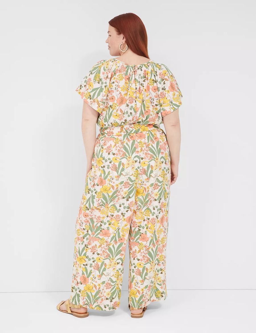 Lane Bryant Flutter-Sleeve Smocked-Neck Wide Leg Jumpsuit Donna Gialle Colorate | FDI302GZ